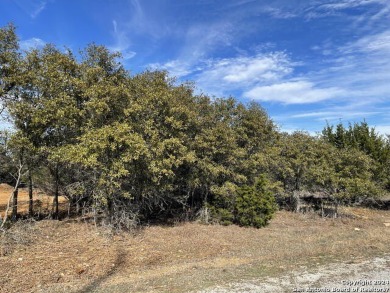 Beautiful level lot located in Rockin' J Ranch that backs up to on Vaaler Creek Golf Club in Texas - for sale on GolfHomes.com, golf home, golf lot