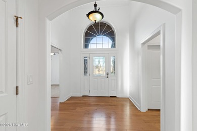 Beautifully built by Trusst, this freshly painted townhome is on Cape Fear National At Brunswick Forest in North Carolina - for sale on GolfHomes.com, golf home, golf lot