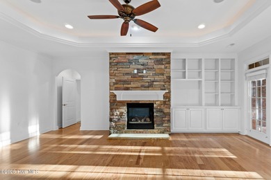 Beautifully built by Trusst, this freshly painted townhome is on Cape Fear National At Brunswick Forest in North Carolina - for sale on GolfHomes.com, golf home, golf lot