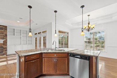 Beautifully built by Trusst, this freshly painted townhome is on Cape Fear National At Brunswick Forest in North Carolina - for sale on GolfHomes.com, golf home, golf lot