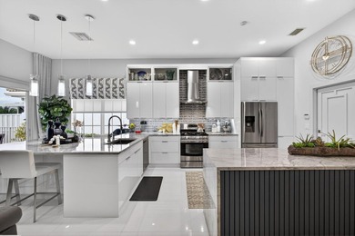 STUNNING NEWLY RE-IMAGINED POOL HOME NESTLED ON PREMIER GOLF on Ibis Golf and Country Club in Florida - for sale on GolfHomes.com, golf home, golf lot