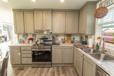 Welcome to Crystal Lake on the border of Surfside Beach and on Prestwick Country Club in South Carolina - for sale on GolfHomes.com, golf home, golf lot