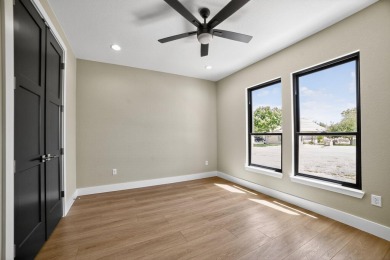 This lovely home is located behind the gates of the Legends on on Legends Golf Course in Texas - for sale on GolfHomes.com, golf home, golf lot
