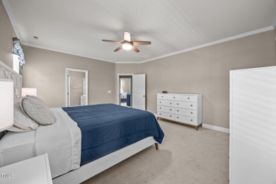 This elegant ranch-style home is located in the highly coveted on Olde Liberty Golf and Country Club in North Carolina - for sale on GolfHomes.com, golf home, golf lot
