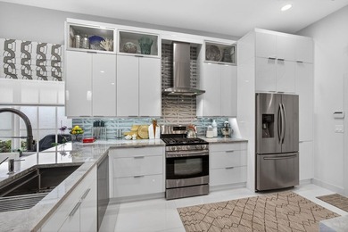 STUNNING NEWLY RE-IMAGINED POOL HOME NESTLED ON PREMIER GOLF on Ibis Golf and Country Club in Florida - for sale on GolfHomes.com, golf home, golf lot