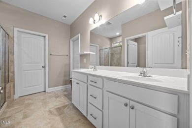This elegant ranch-style home is located in the highly coveted on Olde Liberty Golf and Country Club in North Carolina - for sale on GolfHomes.com, golf home, golf lot