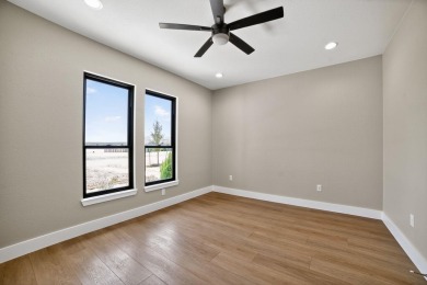 This lovely home is located behind the gates of the Legends on on Legends Golf Course in Texas - for sale on GolfHomes.com, golf home, golf lot