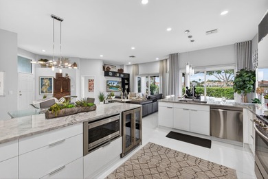 STUNNING NEWLY RE-IMAGINED POOL HOME NESTLED ON PREMIER GOLF on Ibis Golf and Country Club in Florida - for sale on GolfHomes.com, golf home, golf lot