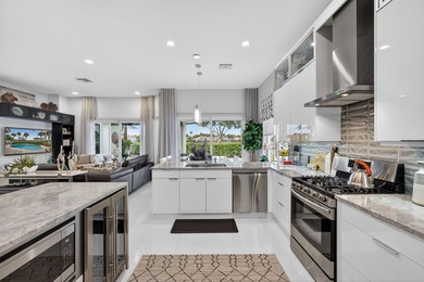 STUNNING NEWLY RE-IMAGINED POOL HOME NESTLED ON PREMIER GOLF on Ibis Golf and Country Club in Florida - for sale on GolfHomes.com, golf home, golf lot