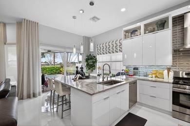 STUNNING NEWLY RE-IMAGINED POOL HOME NESTLED ON PREMIER GOLF on Ibis Golf and Country Club in Florida - for sale on GolfHomes.com, golf home, golf lot