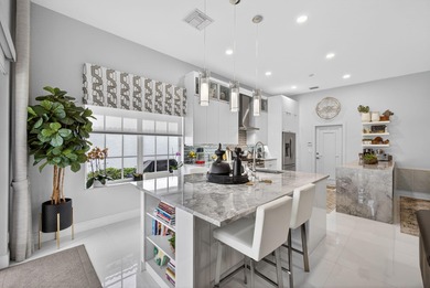 STUNNING NEWLY RE-IMAGINED POOL HOME NESTLED ON PREMIER GOLF on Ibis Golf and Country Club in Florida - for sale on GolfHomes.com, golf home, golf lot