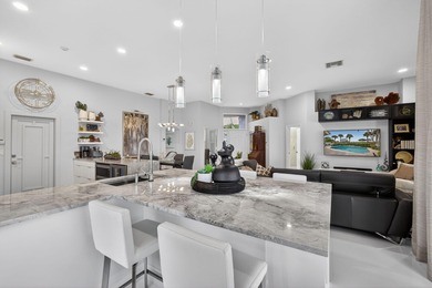 STUNNING NEWLY RE-IMAGINED POOL HOME NESTLED ON PREMIER GOLF on Ibis Golf and Country Club in Florida - for sale on GolfHomes.com, golf home, golf lot