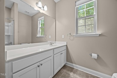 This elegant ranch-style home is located in the highly coveted on Olde Liberty Golf and Country Club in North Carolina - for sale on GolfHomes.com, golf home, golf lot