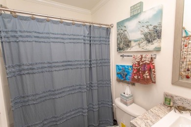 Welcome to Crystal Lake on the border of Surfside Beach and on Prestwick Country Club in South Carolina - for sale on GolfHomes.com, golf home, golf lot