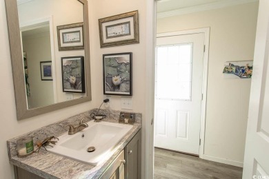 Welcome to Crystal Lake on the border of Surfside Beach and on Prestwick Country Club in South Carolina - for sale on GolfHomes.com, golf home, golf lot