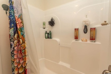 Welcome to Crystal Lake on the border of Surfside Beach and on Prestwick Country Club in South Carolina - for sale on GolfHomes.com, golf home, golf lot