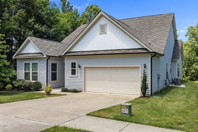 This elegant ranch-style home is located in the highly coveted on Olde Liberty Golf and Country Club in North Carolina - for sale on GolfHomes.com, golf home, golf lot