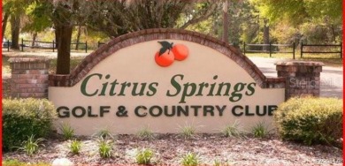 Nestled in the heart of Citrus Springs, this residential on Citrus Springs Country Club in Florida - for sale on GolfHomes.com, golf home, golf lot