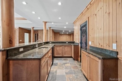 Welcome to this stunning estate in the prestigious, gated Turtle on Forest Lake Country Club in Michigan - for sale on GolfHomes.com, golf home, golf lot