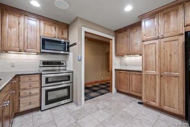 Welcome to this stunning estate in the prestigious, gated Turtle on Forest Lake Country Club in Michigan - for sale on GolfHomes.com, golf home, golf lot