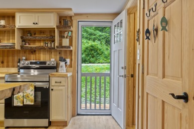 Renovated Barrington Cottage with Stunning Water Views  Beach on Nippo Lake Golf Club in New Hampshire - for sale on GolfHomes.com, golf home, golf lot