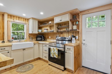 Renovated Barrington Cottage with Stunning Water Views  Beach on Nippo Lake Golf Club in New Hampshire - for sale on GolfHomes.com, golf home, golf lot