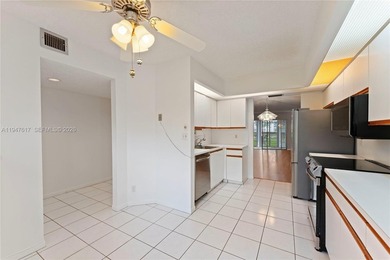 Welcome to this updated condo in the highly sought-after Andros on Wynmoor Golf Course in Florida - for sale on GolfHomes.com, golf home, golf lot