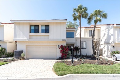 STUNNING COASTAL 3 BEDROOM, 2.5 BATH TOWNHOME WITH 1915 HSF OF on Isla Del Sol Yacht and Country Club in Florida - for sale on GolfHomes.com, golf home, golf lot