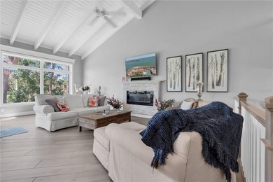 STUNNING COASTAL 3 BEDROOM, 2.5 BATH TOWNHOME WITH 1915 HSF OF on Isla Del Sol Yacht and Country Club in Florida - for sale on GolfHomes.com, golf home, golf lot