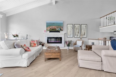 STUNNING COASTAL 3 BEDROOM, 2.5 BATH TOWNHOME WITH 1915 HSF OF on Isla Del Sol Yacht and Country Club in Florida - for sale on GolfHomes.com, golf home, golf lot