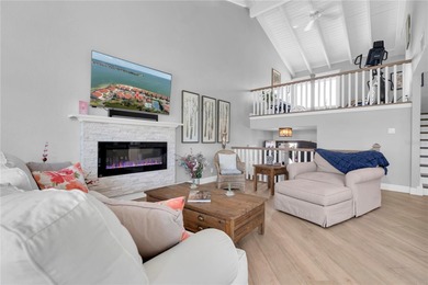 STUNNING COASTAL 3 BEDROOM, 2.5 BATH TOWNHOME WITH 1915 HSF OF on Isla Del Sol Yacht and Country Club in Florida - for sale on GolfHomes.com, golf home, golf lot