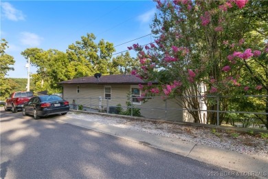 Welcome to this charming 3-bedroom, 2.5-bathroom home, ideally on Bear Creek Valley Golf Club in Missouri - for sale on GolfHomes.com, golf home, golf lot