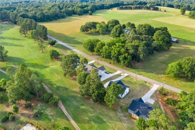 Introducing a stunning New Construction, Modern Farmhouse on Cobbs Glen Country Club in South Carolina - for sale on GolfHomes.com, golf home, golf lot