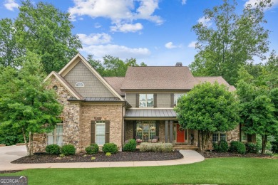 Welcome to Traditions of Braselton, enjoy a beautiful drive thru on Traditions of Braselton Golf Club in Georgia - for sale on GolfHomes.com, golf home, golf lot