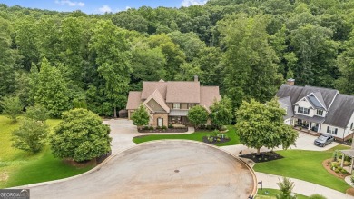 Welcome to Traditions of Braselton, enjoy a beautiful drive thru on Traditions of Braselton Golf Club in Georgia - for sale on GolfHomes.com, golf home, golf lot