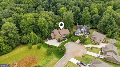 Welcome to Traditions of Braselton, enjoy a beautiful drive thru on Traditions of Braselton Golf Club in Georgia - for sale on GolfHomes.com, golf home, golf lot