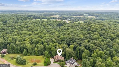 Welcome to Traditions of Braselton, enjoy a beautiful drive thru on Traditions of Braselton Golf Club in Georgia - for sale on GolfHomes.com, golf home, golf lot