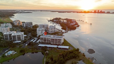 Experience refined coastal living at its finest in this on Belleair Country Club in Florida - for sale on GolfHomes.com, golf home, golf lot