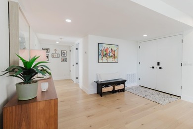 Experience refined coastal living at its finest in this on Belleair Country Club in Florida - for sale on GolfHomes.com, golf home, golf lot