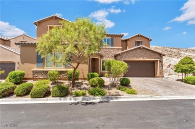 This exquisite two-story home offers 4,569 square feet of on Southern Highlands Golf Club in Nevada - for sale on GolfHomes.com, golf home, golf lot