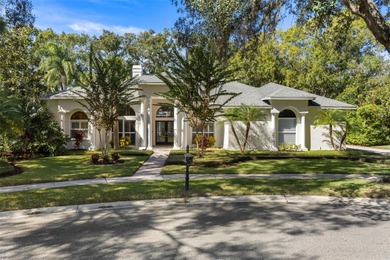 Introducing an impeccably maintained estate home nestled within on Tampa Palms Golf and Country Club in Florida - for sale on GolfHomes.com, golf home, golf lot