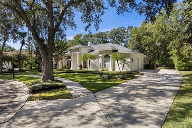 Introducing an impeccably maintained estate home nestled within on Tampa Palms Golf and Country Club in Florida - for sale on GolfHomes.com, golf home, golf lot