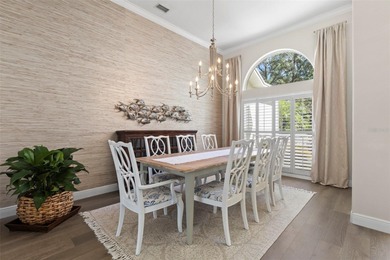 Introducing an impeccably maintained estate home nestled within on Tampa Palms Golf and Country Club in Florida - for sale on GolfHomes.com, golf home, golf lot