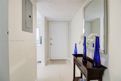 PRIDE OF OWNERSHIP IS REFLECTED THROUGHOUT THIS IMPECCABLY on Flamingo Lakes Country Club in Florida - for sale on GolfHomes.com, golf home, golf lot