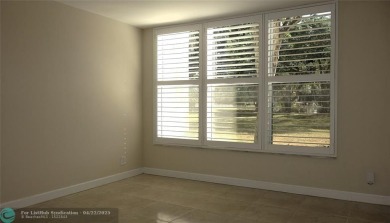 *Fully renovated first-floor condo in lush Palm Aire featuring on Palm-Aire Country Club and Resort - Palms in Florida - for sale on GolfHomes.com, golf home, golf lot