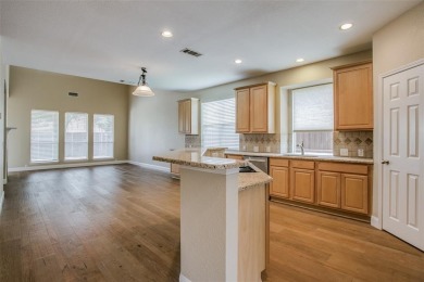 2.3 miles from the Dallas North Tollway is this stunning home in on The Trails of Frisco Golf Club in Texas - for sale on GolfHomes.com, golf home, golf lot