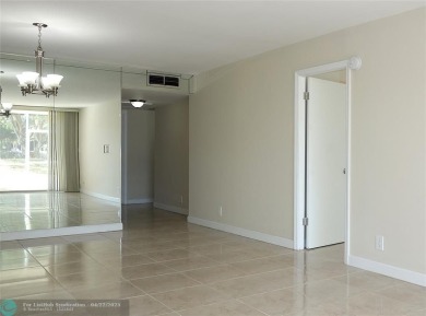 *Fully renovated first-floor condo in lush Palm Aire featuring on Palm-Aire Country Club and Resort - Palms in Florida - for sale on GolfHomes.com, golf home, golf lot