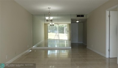 *Fully renovated first-floor condo in lush Palm Aire featuring on Palm-Aire Country Club and Resort - Palms in Florida - for sale on GolfHomes.com, golf home, golf lot