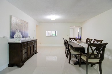 PRIDE OF OWNERSHIP IS REFLECTED THROUGHOUT THIS IMPECCABLY on Flamingo Lakes Country Club in Florida - for sale on GolfHomes.com, golf home, golf lot