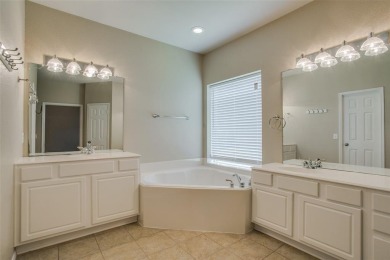 2.3 miles from the Dallas North Tollway is this stunning home in on The Trails of Frisco Golf Club in Texas - for sale on GolfHomes.com, golf home, golf lot